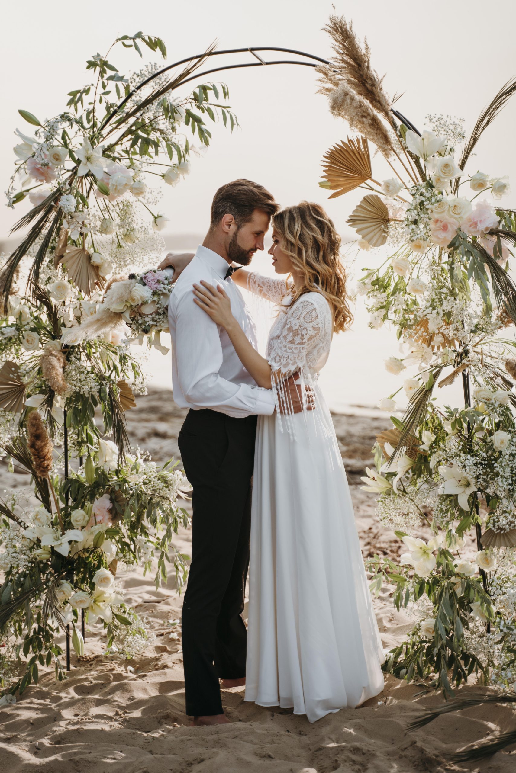 bride-groom-having-their-wedding-beach